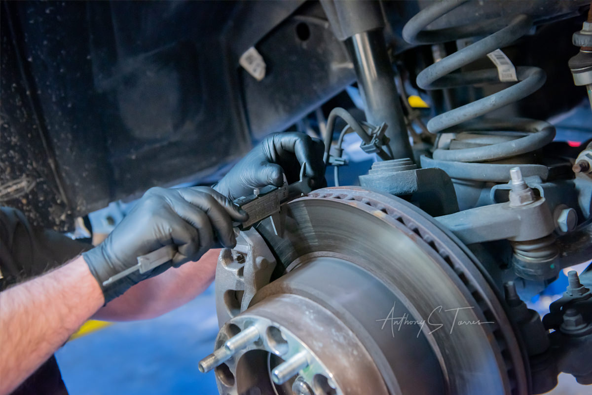 CarFix auto repair in action, technician at work, Raleigh NC