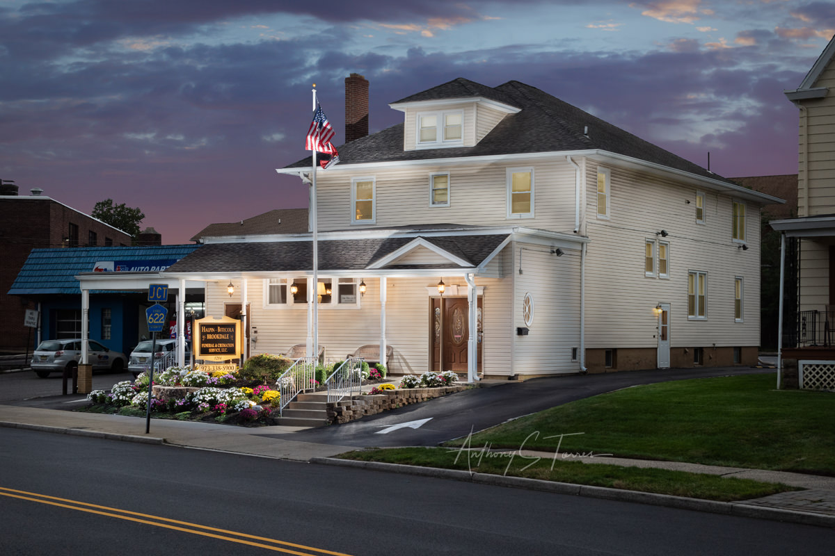 Light-painted funeral home exterior